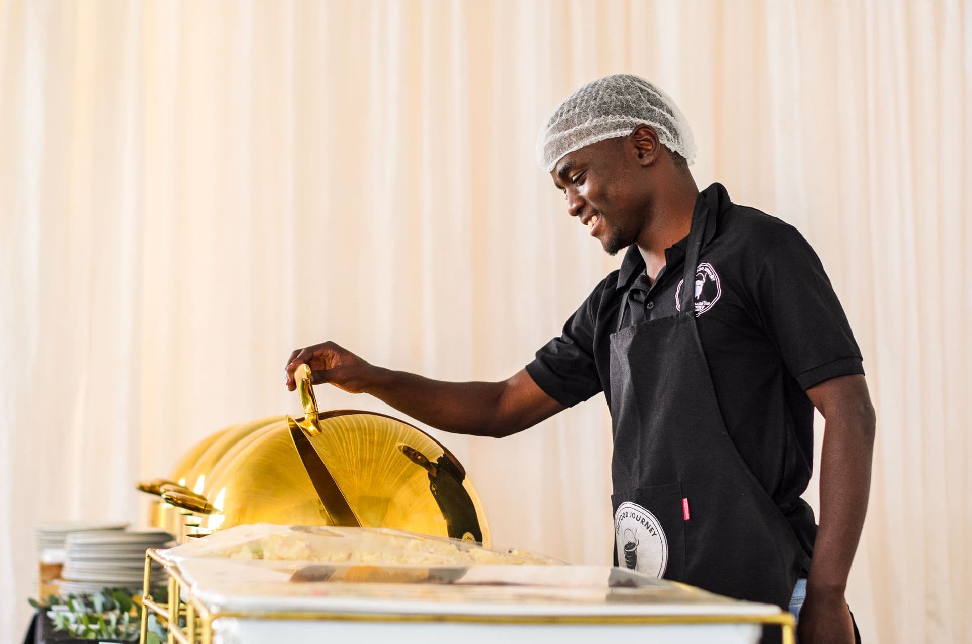 Catering team preparing food for a large event