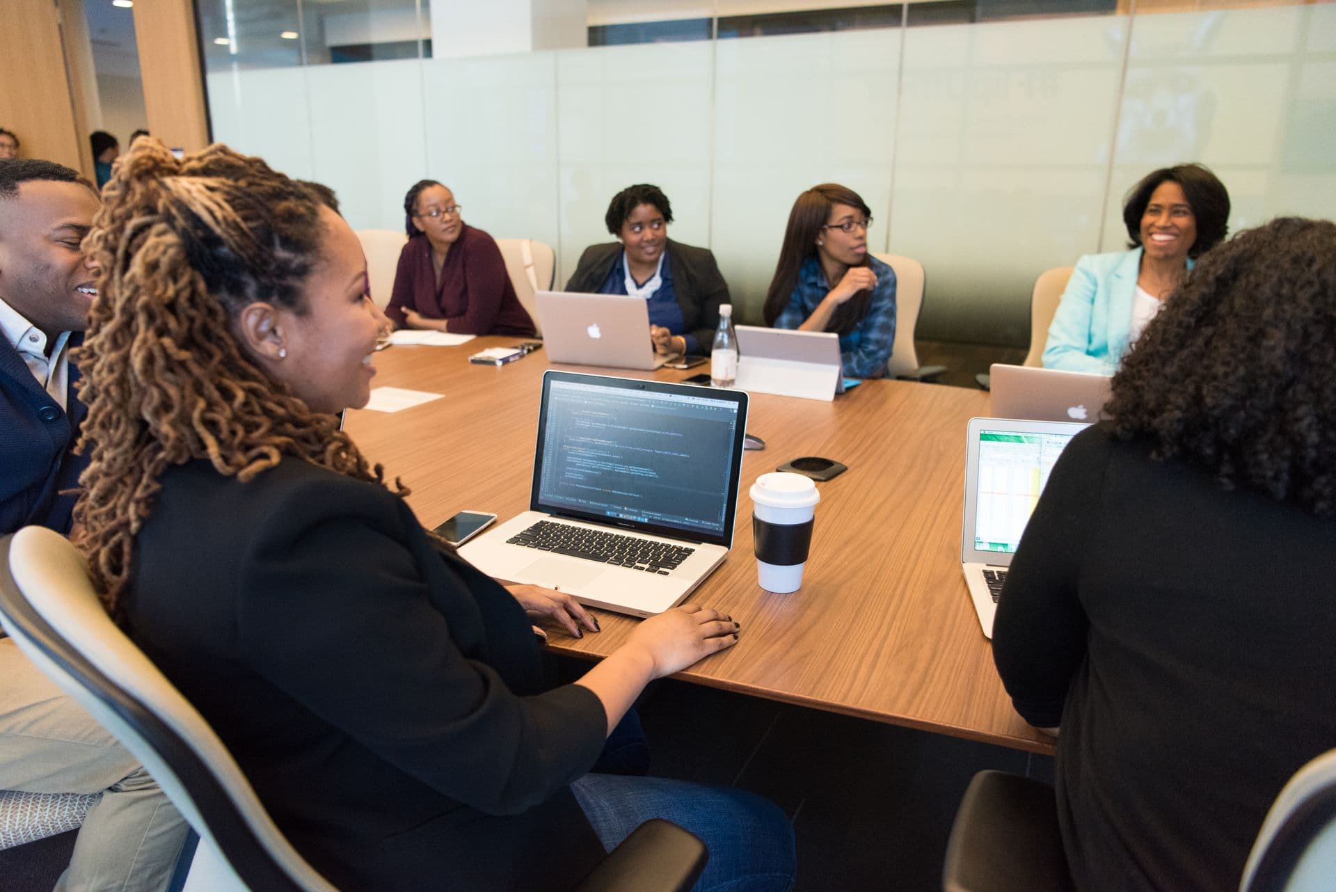 Small business team reviewing matching government tenders together